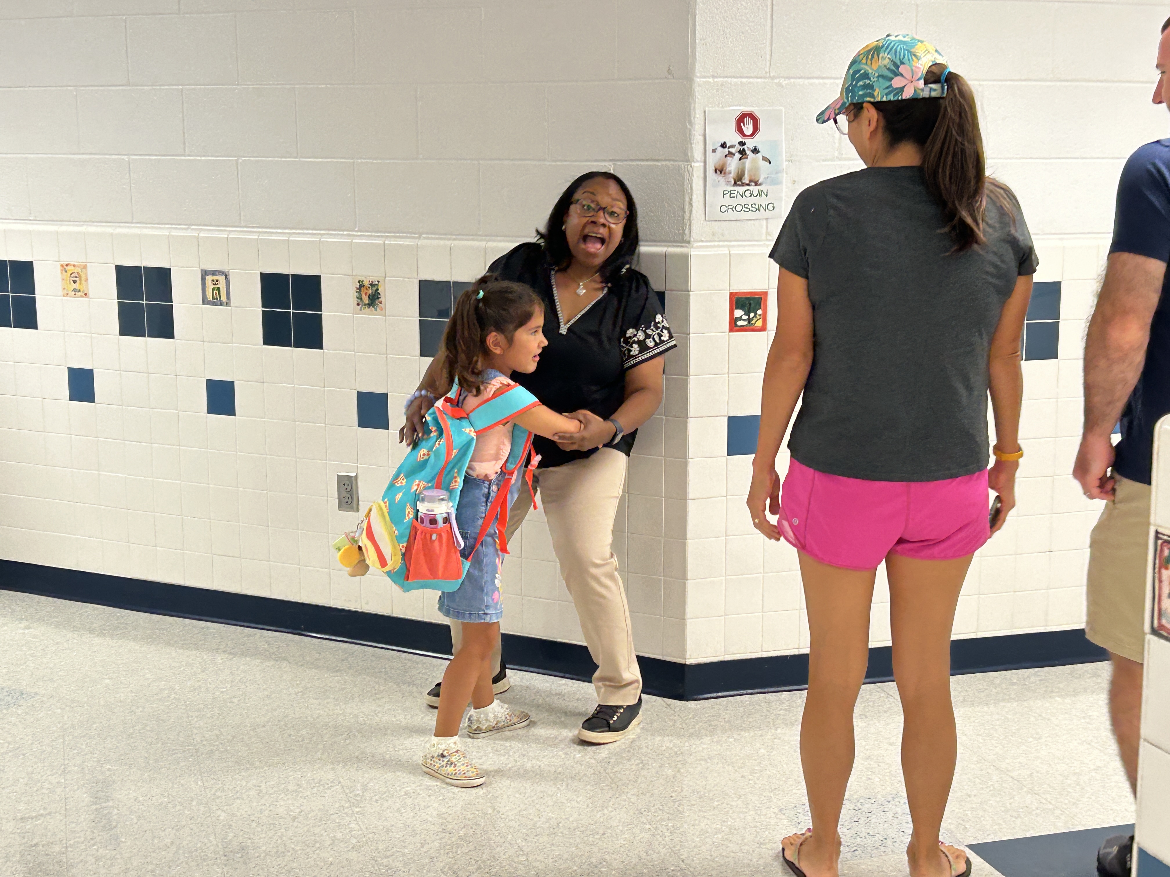 Teachers and students and families reuniting