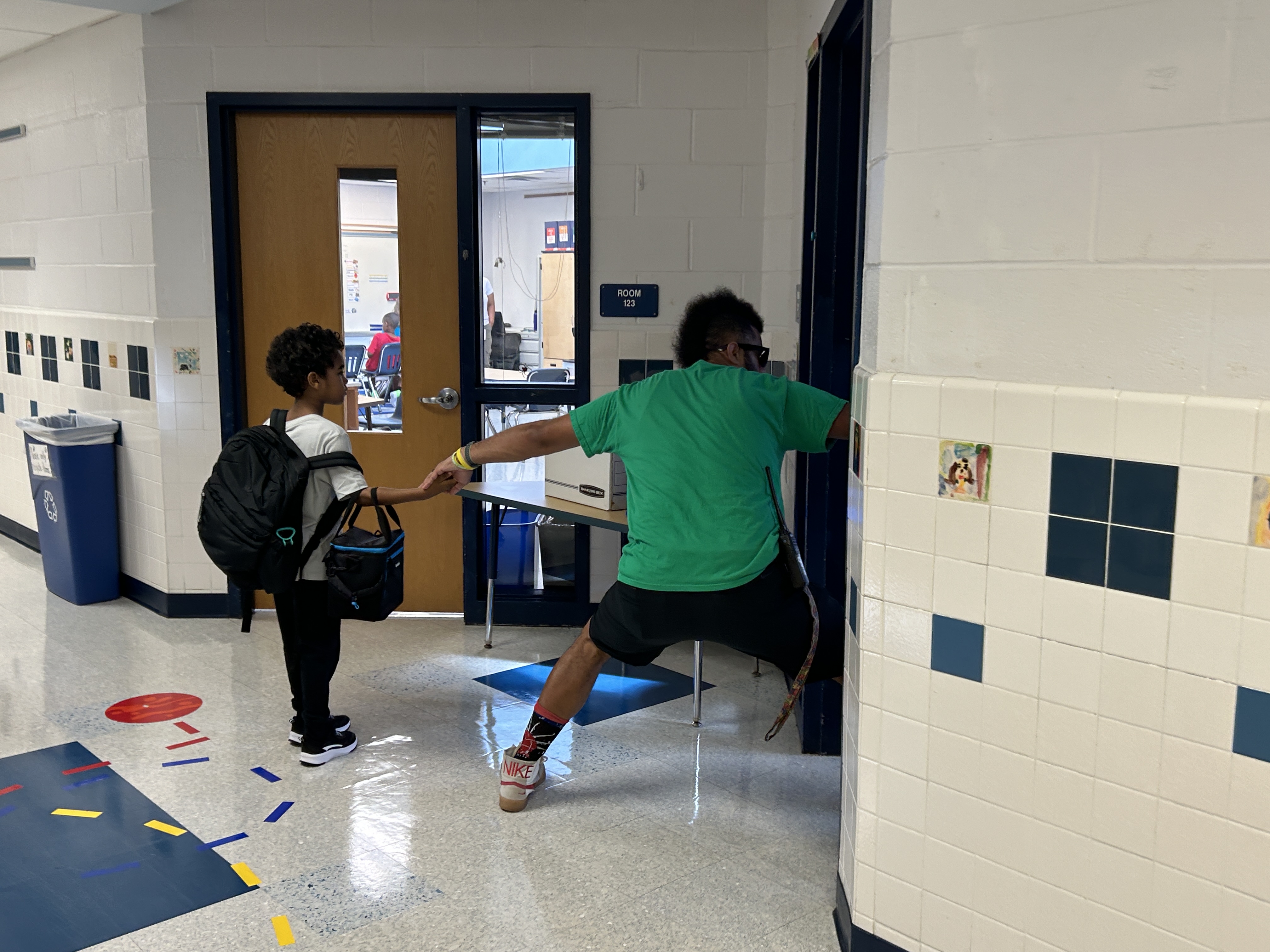 Teachers and students and families reuniting