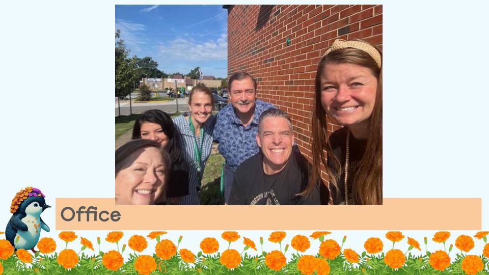 Staff planting marigolds